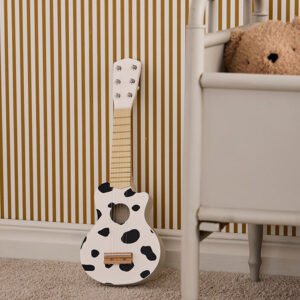 Speelgoedgitaar Kid's Concept zwart wit gevlekt sfeer