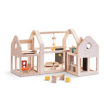Houten poppenhuis met meubilair uitschuifbaar van Plan Toys