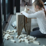 Spelen met een blokkentoren