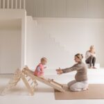 Glijbaan komt uit op puzzelmatten Jindl bruin