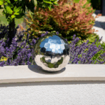 Zilveren tuimelbal tickit