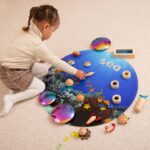 Speelidee met de ronde Tickit onderwatermat, tafel en figuren apart verkrijgbaar